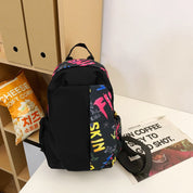 Sam | Axelremsväska med graffiti-design och stöldskydd