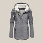 Damen Steppjacke mit Kapuze und wärmendem Fleecefutter für kalte Wintertage 1