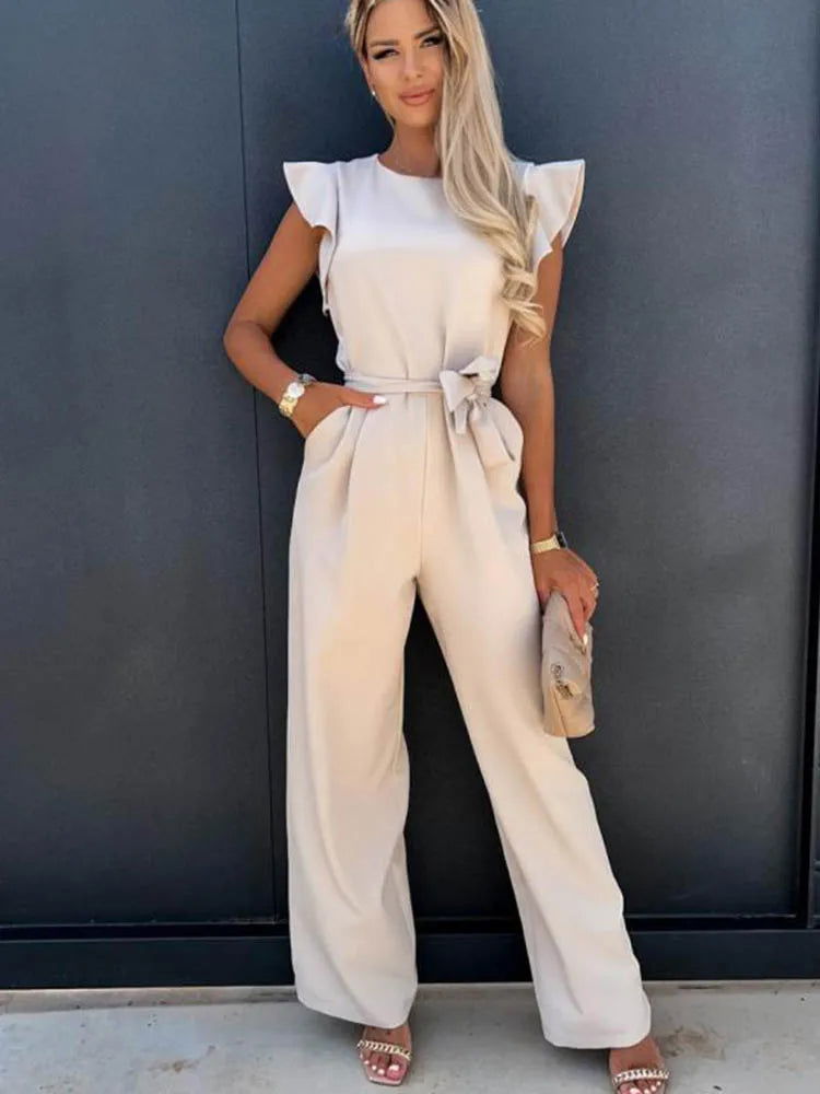 Chic elfenbensvit jumpsuit med elegant rosett detalj