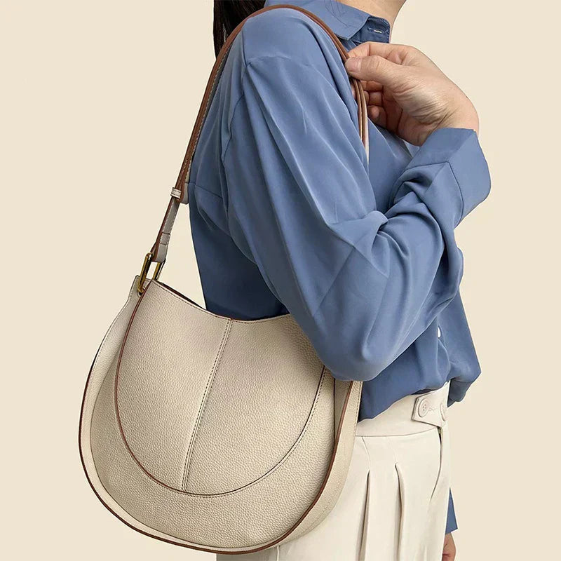 Elegante, runde Damen-Schultertasche aus Leder 1
