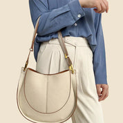 Elegante, runde Damen-Schultertasche aus Leder 2