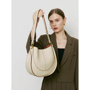 Elegante, runde Damen-Schultertasche aus Leder 4