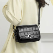 Nova | Croco-mönstrad läder crossbody mini slingväska