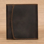 Lucas | Vintage bifold resväska i nötläder med tryckknapp