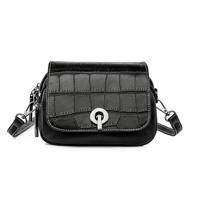 Nova | Croco-mönstrad läder crossbody mini slingväska