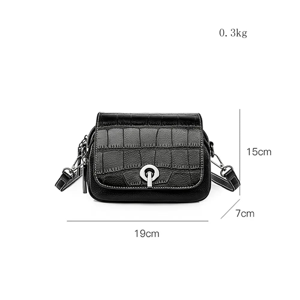 Nova | Croco-mönstrad läder crossbody mini slingväska