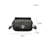 Nova | Croco-mönstrad läder crossbody mini slingväska