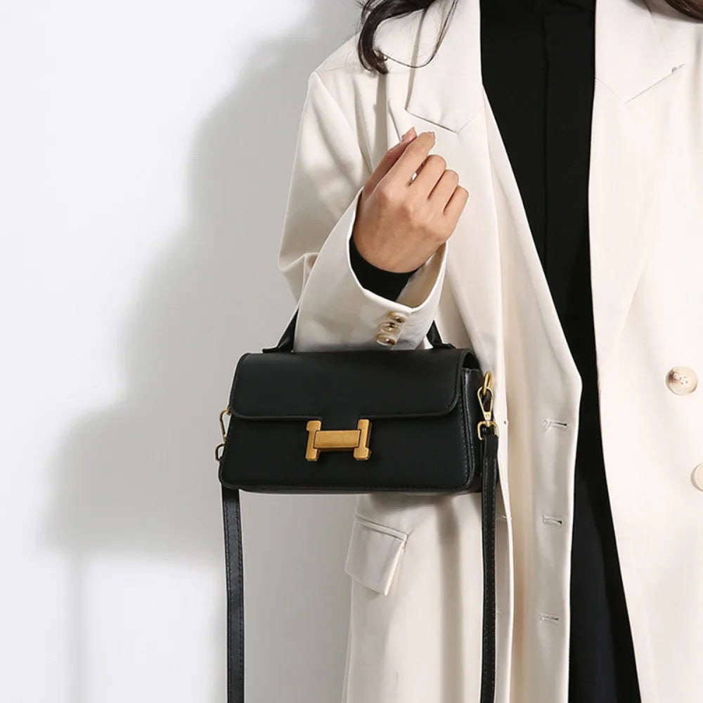 Lila | Chic vintageinspirerad axelväska