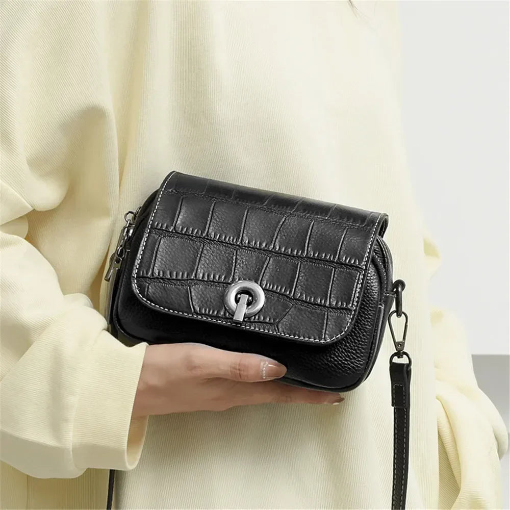 Nova | Croco-mönstrad läder crossbody mini slingväska