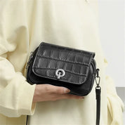 Nova | Croco-mönstrad läder crossbody mini slingväska