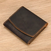 Lucas | Vintage bifold resväska i nötläder med tryckknapp