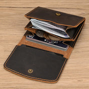 Lucas | Vintage bifold resväska i nötläder med tryckknapp