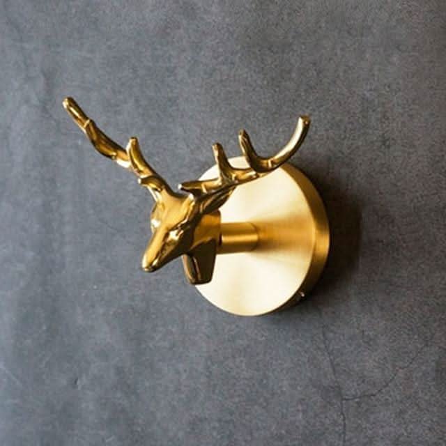 Wandhakenleiste aus Messing mit Tiermotiven und goldenen Akzenten 7