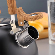 Vattenkokare i rostfritt stål för spisen – med visselfunktion och ergonomiskt handtag